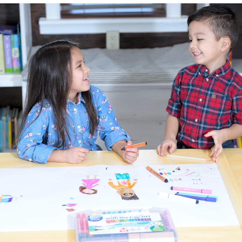 children coloring and laughing with magic stix markers