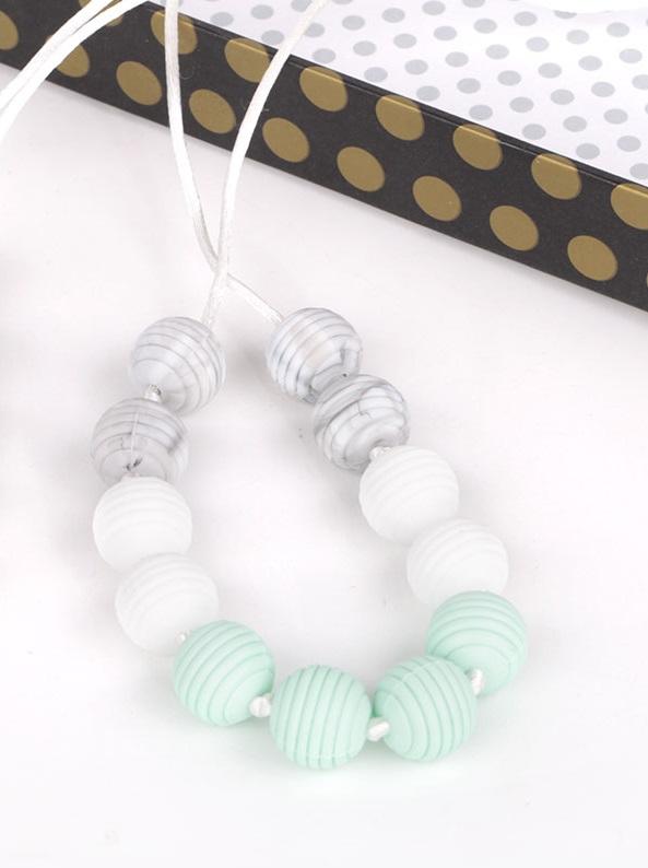 silicone teething necklace with white marble and aqua ripple beads