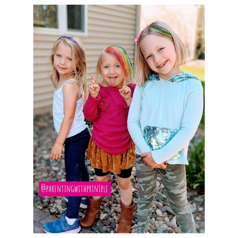 little girls with rainbow colored hair chalk